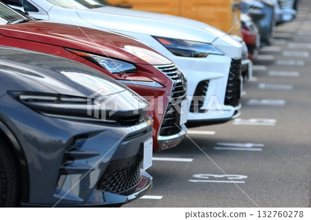 Image of cars lined up in a parking lot Image of cars lined up in a parking lot 132760278
