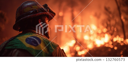 Brazilian Firefighter Faces Jungle Blaze with National Flag in Background Brazilian Firefighter Faces Jungle Blaze with National Flag in Background 132760573