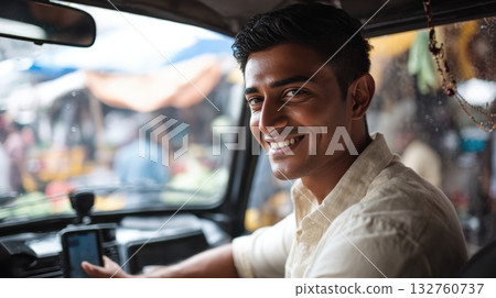 Smiling Man Setting GPS in Car with Bustling City Market View 132760737