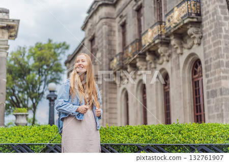 Young woman tourist standing near Chapultepec Castle in Mexico City, exploring the historic landmark. Solo travel, cultural heritage, tourism, and adventure concept Young woman tourist standing near Chapultepec Castle in Mexico City, exploring the historic landmark. Solo travel, cultural heritage, tourism, and adventure concept 132761907