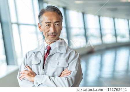 Senior man in work clothes 132762441