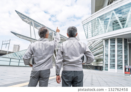 A male site supervisor having a meeting at a construction site A male site supervisor having a meeting at a construction site 132762458