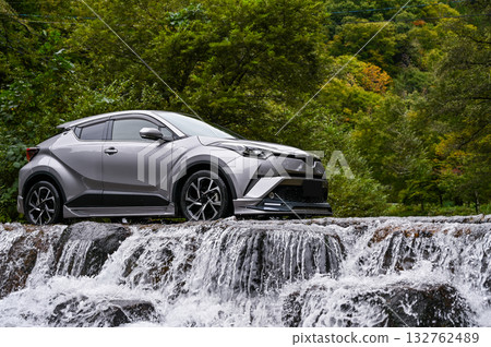 A washout and a car on Kakureha Plateau in Takayama City, Gifu Prefecture A washout and a car on Kakureha Plateau in Takayama City, Gifu Prefecture 132762489