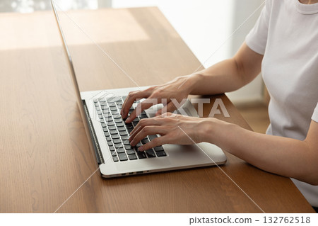 Women handling personal computers Women handling personal computers 132762518