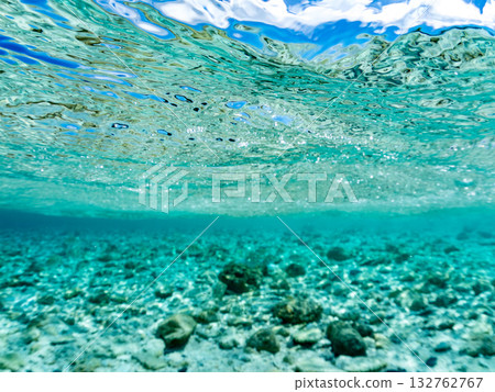 A half-surface shot of a white sand beach. Beautiful coral reefs and schools of tropical fish. Kabi Island, Zamami Island, Kerama Islands, Shimajiri District, Okinawa Prefecture 132762767