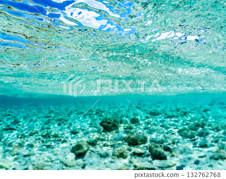 A half-surface shot of a white sand beach. Beautiful coral reefs and schools of tropical fish. Kabi Island, Zamami Island, Kerama Islands, Shimajiri District, Okinawa Prefecture 132762768