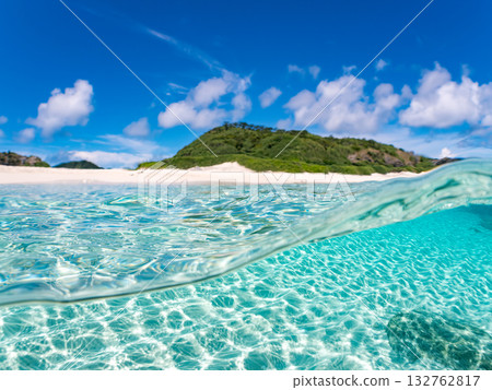 A half-surface shot of a white sand beach. Beautiful coral reefs and schools of tropical fish. Kabi Island, Zamami Island, Kerama Islands, Shimajiri District, Okinawa Prefecture A half-surface shot of a white sand beach. Beautiful coral reefs and schools of tropical fish. Kabi Island, Zamami Island, Kerama Islands, Shimajiri District, Okinawa Prefecture 132762817