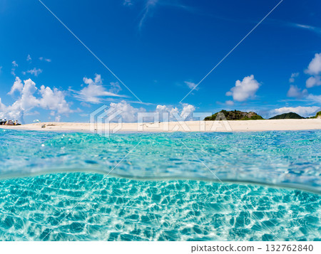 A half-surface shot of a white sand beach. Beautiful coral reefs and schools of tropical fish. Kabi Island, Zamami Island, Kerama Islands, Shimajiri District, Okinawa Prefecture A half-surface shot of a white sand beach. Beautiful coral reefs and schools of tropical fish. Kabi Island, Zamami Island, Kerama Islands, Shimajiri District, Okinawa Prefecture 132762840