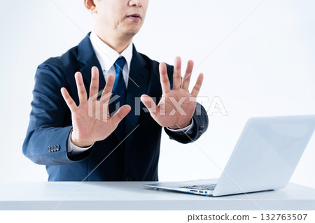 Man making a reluctant stop gesture Man making a reluctant stop gesture 132763507