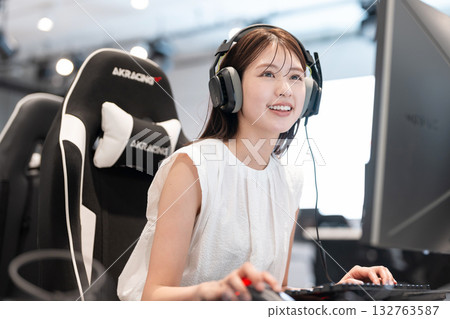 Young woman enjoying games at an e-sports tournament 132763587
