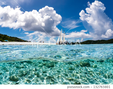 Partially submerged shot of Okinawa's Sabani and white sand beach. Beautiful coral reefs and schools of tropical fish. Kabi Island, Kerama Islands, Shimajiri District, Okinawa Prefecture Partially submerged shot of Okinawa's Sabani and white sand beach. Beautiful coral reefs and schools of tropical fish. Kabi Island, Kerama Islands, Shimajiri District, Okinawa Prefecture 132763801