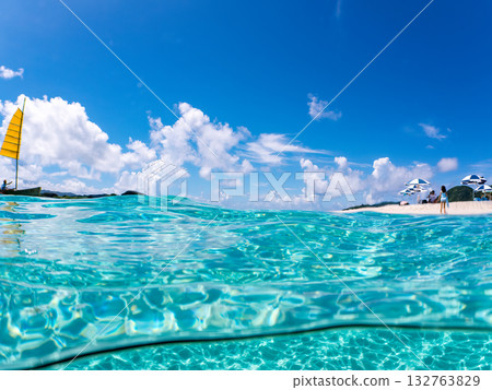 Partially submerged shot of Okinawa's Sabani and white sand beach. Beautiful coral reefs and schools of tropical fish. Kabi Island, Kerama Islands, Shimajiri District, Okinawa Prefecture 132763829
