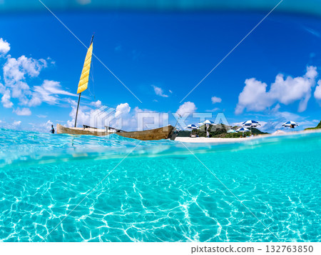Partially submerged shot of Okinawa's Sabani and white sand beach. Beautiful coral reefs and schools of tropical fish. Kabi Island, Kerama Islands, Shimajiri District, Okinawa Prefecture Partially submerged shot of Okinawa's Sabani and white sand beach. Beautiful coral reefs and schools of tropical fish. Kabi Island, Kerama Islands, Shimajiri District, Okinawa Prefecture 132763850