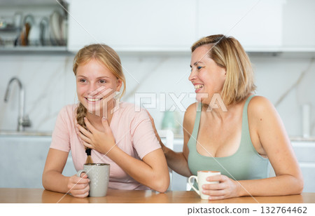 During tea party, girl laugh and tell mother plot of modern new comedy, movies During tea party, girl laugh and tell mother plot of modern new comedy, movies 132764462