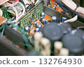 Close-up of the internal circuit board and electronic components of an audio amplifier 132764930