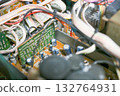 Close-up of the internal circuit board and electronic components of an audio amplifier 132764931