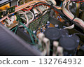 Close-up of the internal circuit board and electronic components of an audio amplifier 132764932