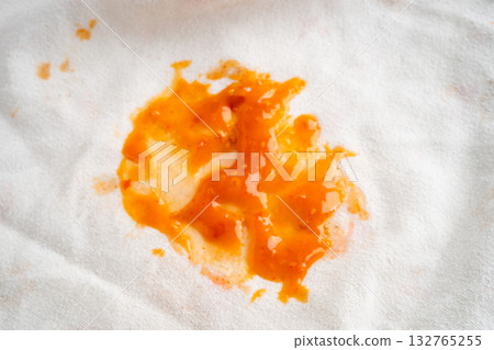 Dirty tomato sauce stain or ketchup on cloth. 132765255