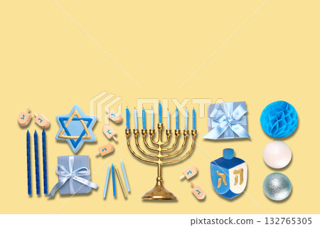 Hanukkah, decorations including a menorah and dreidels Hanukkah, decorations including a menorah and dreidels 132765305