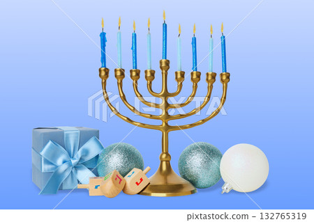 Gold menorah with blue candles alongside gift box and ornaments 132765319