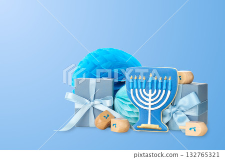 Festive Hanukkah decorations including gifts and a menorah Festive Hanukkah decorations including gifts and a menorah 132765321