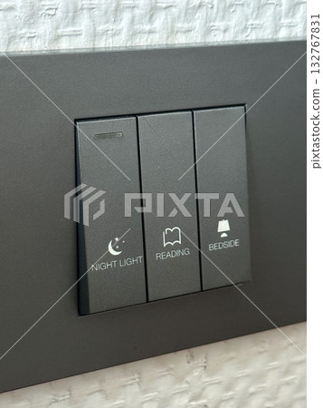 closeup black power switches with function text 132767831