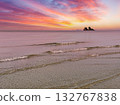 seascape with stone island and beautiful sunset sky 132767838