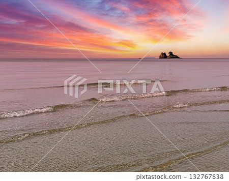 seascape with stone island and beautiful sunset sky seascape with stone island and beautiful sunset sky 132767838