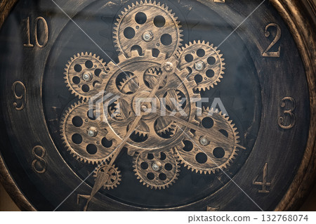 Vintage clock mechanism, close-up fragment with shiny gears, blue toned photo 132768074