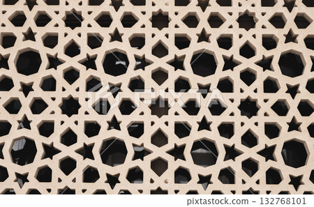 Sandstone decoration pattern jali background. Carved sandstone window in jali pattern Sandstone decoration pattern jali background. Carved sandstone window in jali pattern 132768101