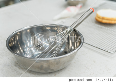 Kitchen, bowl and whisk in the kitchen 132768114