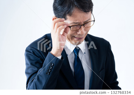 A businessman with a troubled look 132768334