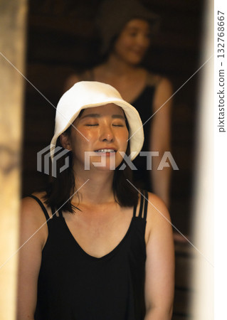 Woman enjoying the sauna Woman enjoying the sauna 132768667