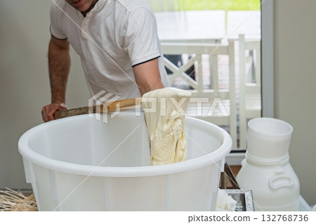 Crafting Fresh Mozzarella Cheese Artisan Skill and Traditional Italian Dairy Process 132768736