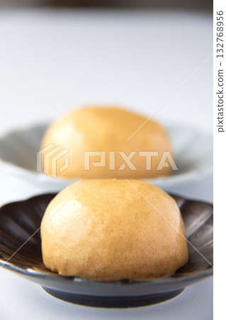 Onsen manju on a plate 132768956
