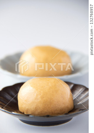 Onsen manju on a plate 132768957