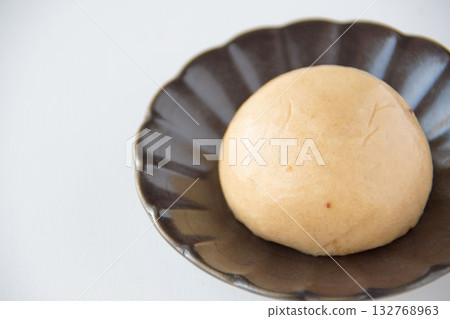 Onsen manju on a plate 132768963