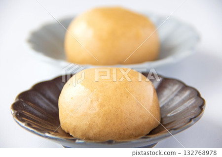 Onsen manju on a plate 132768978