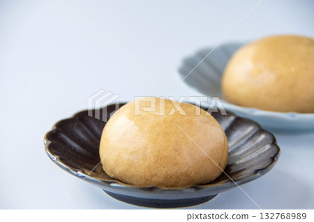 Hot spring buns on a plate 132768989