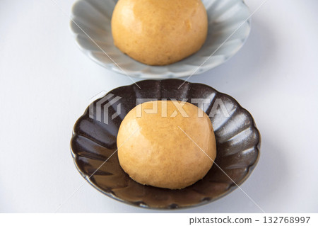 Onsen manju on a plate Onsen manju on a plate 132768997