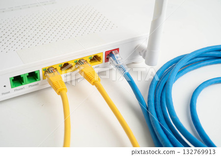 Ethernet cable with wireless router connect to internet service provider network. Ethernet cable with wireless router connect to internet service provider network. 132769913