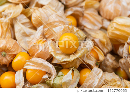 Pile of cape gooseberry on market 132770063