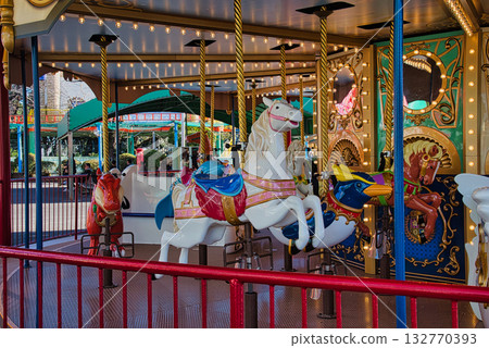 A local amusement park that's popular with children, filled with colorful rides 132770393