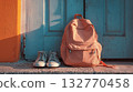 A quiet photo of backpacks and sneakers lined up in the entrance A quiet photo of backpacks and sneakers lined up in the entrance 132770458