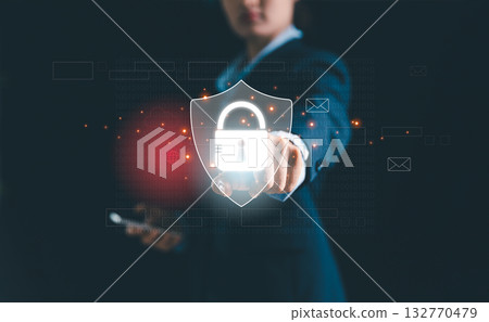 Businesswoman stands before virtual security system, futuristic technology like biometric fingerprint scanner, password, key access to guard sensitive data-illustrating concept of digital protection. Businesswoman stands before virtual security system, futuristic technology like biometric fingerprint scanner, password, key access to guard sensitive data-illustrating concept of digital protection. 132770479