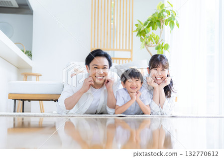 Family image: Family lying on the floor 132770612
