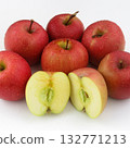 A bunch of delicious looking apples and their cross sections 132771213