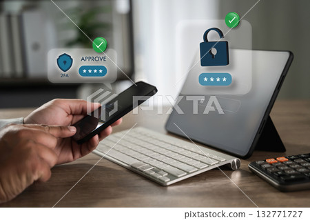 Two-factor authentication (2FA) approve login on smartphone Cybersecurity (2FA). User approves a sign-in request on smartphone to unlock a device Two-factor authentication (2FA) approve login on smartphone Cybersecurity (2FA). User approves a sign-in request on smartphone to unlock a device 132771727