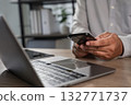 man checking new email notification on phone in workplace Communication networking or social media. Agenda, app and schedule with man checking calendar 132771737