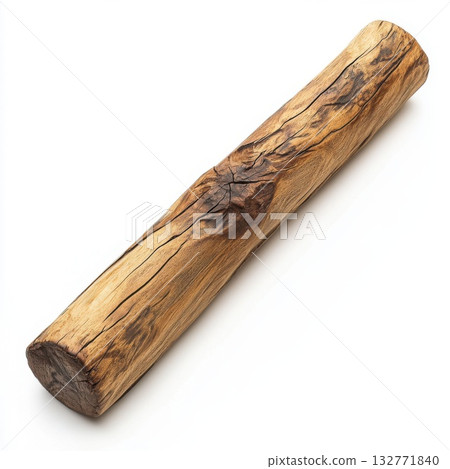 Rustic wooden log resting on a white surface showing natural grain and texture details 132771840